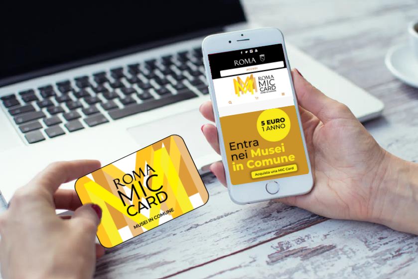 La MIC Card fisica e il sito della MIC Card su uno smartphone